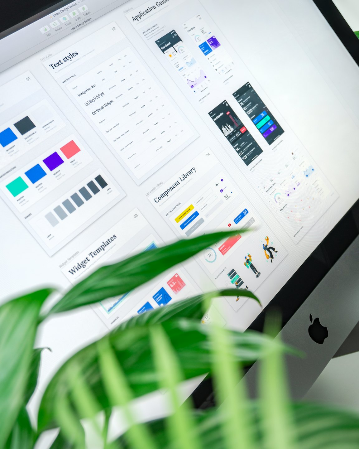 Desktop monitor showing a user interface design system.